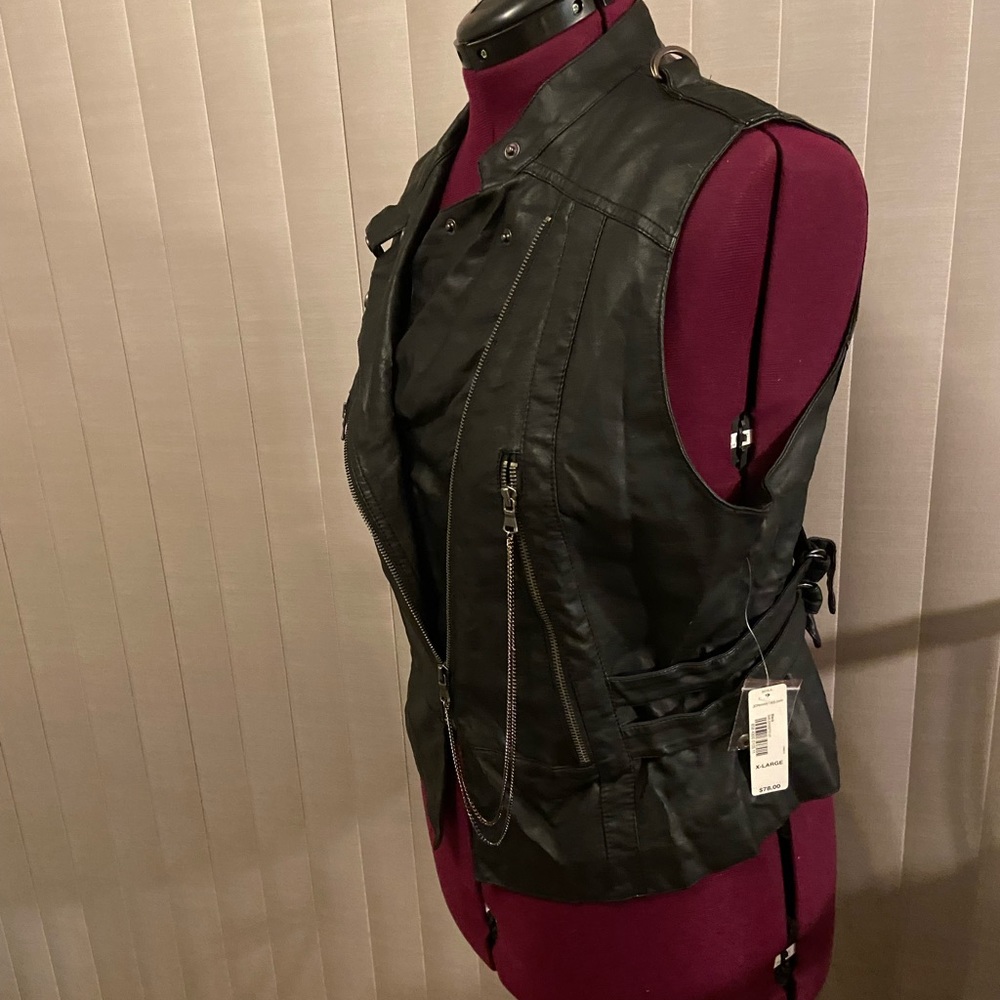 Faux  leather Vest black with zipper and snaps.